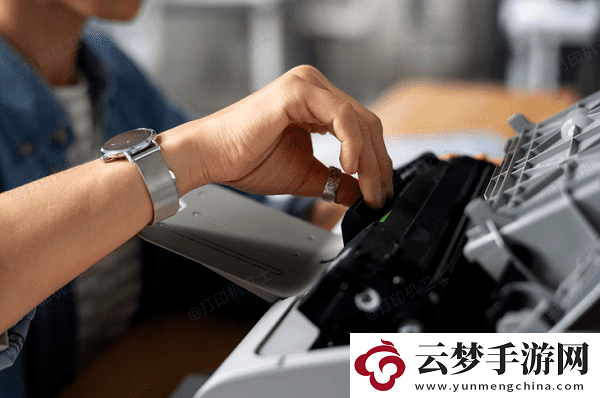 佳能打印機卡紙了怎么把紙拿出來